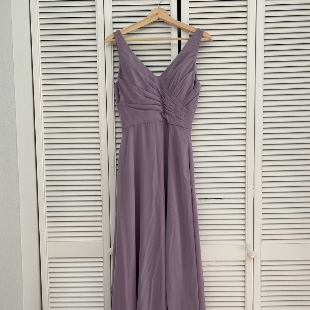 Very flattering and comfortable. Only worn once.
